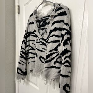 Zebra print distressed cropped sweater